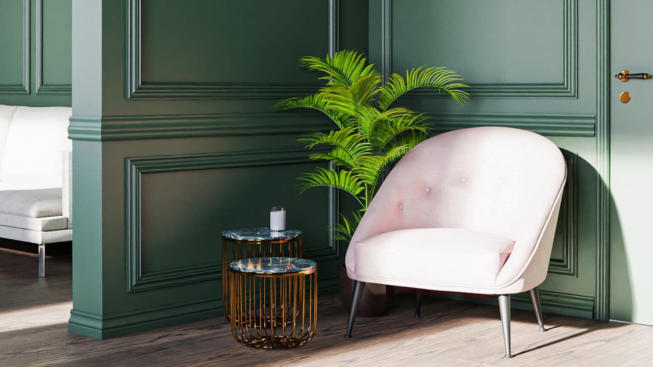 Profilerte lister i grønn stue med listverk på vegg som gir en herskapelig stil.